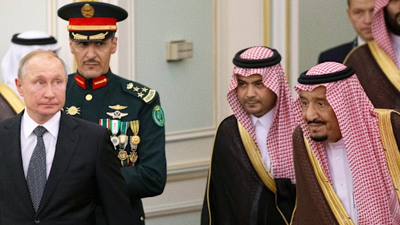 Russian President Vladimir Putin, center left, and Saudi Arabia's King Salman, right, attend the official welcome ceremony in Riyadh, Saudi Arabia.