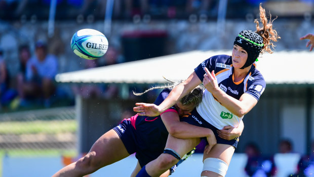 Georgia O'Neill gets an offload away.