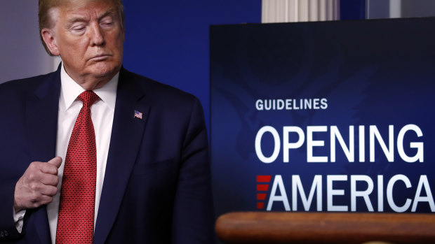 President Donald Trump listens during a briefing about the coronavirus in the White House.