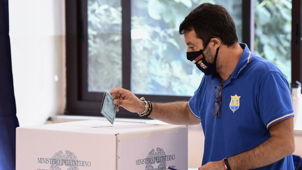 Right-wing opposition leader Matteo Salvini casts his ballot in a polling station in Milan, Italy.