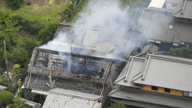 Smoke rises from a house blaze in Takatsuki, Osaka, following an earthquake on Monday. 