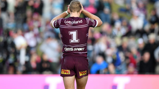 Sinking feeling: Tom Trbojevic cuts a disconsolate figure after Manly blew a big lead late in the game.