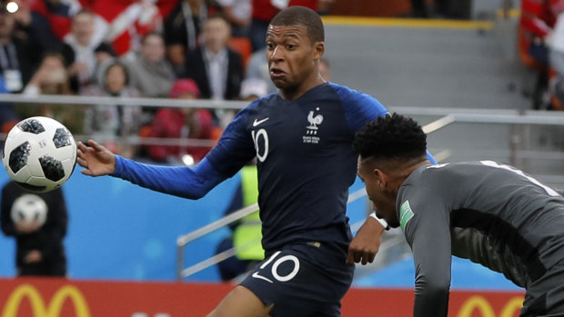 All to play for: France's Kylian Mbappe scores against Peru to maintain top spot in Group C, a position the Socceroos hope they will be keen to hold on to against Denmark.