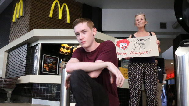 Noah Nicholson and Michelle Beavis protest for better working conditions at McDonald's in Brisbane 