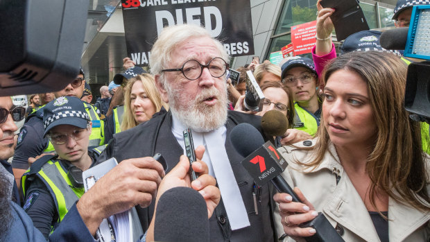 Cardinal Pell's lawyer speaks outside court on Wednesday. 