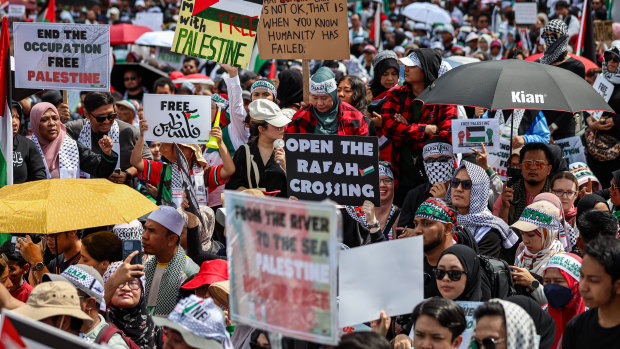 Palestinian supporters come together at an earlier event at Merdeka Square in Kuala Lumpur on Saturday.