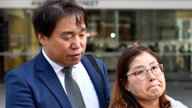 Hyeong-Gyu Ban (left) and Suk Bun Jung, the parents of Eunji Ban, talking to the media outside the Supreme Court in Brisbane on Thursday.