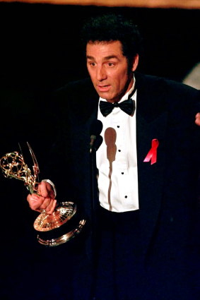 Richards accepting his award for outstanding supporting actor in a comedy series at the 1997 Emmys.