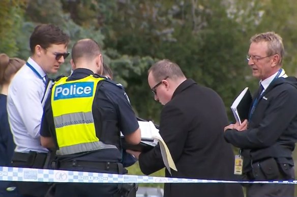 Police at the Northcote property on Thursday where a woman’s body was discovered. 