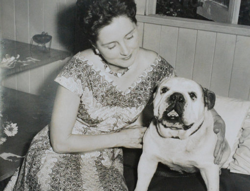 Joy Christensen as a younger woman with her bulldog Bullie.