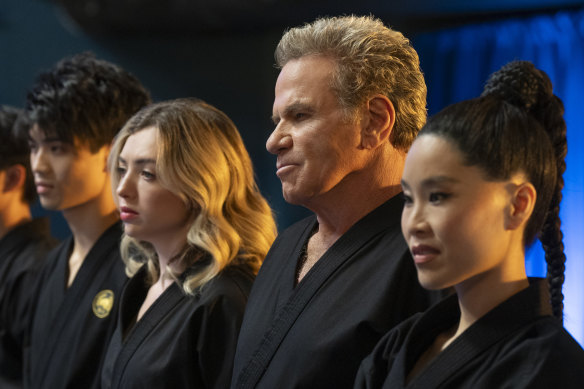 Brandon H. Lee (left) as Kwon, Peyton List as Tory Nichols, Martin Kove as John Kreese, Alicia Hannah-Kim as Kim Da-Eun in Cobra Kai.