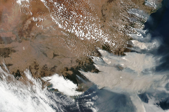 A January 4 satellite image from NASA shows smoke from the Black Summer fires in Victoria and NSW. If they had been their own country, they would have been one of the world’s top emitters.