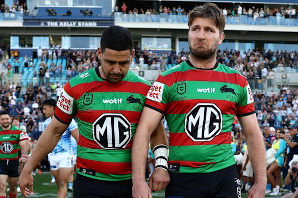 Cody Walker and Jai Arrow make an emotional entry onto the field on the Gold Coast.