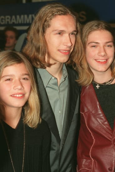 Hanson, from left, Zac, Isaac, center, and Taylor, arrive at Radio City Music Hall in New York, for the 40th annual Grammy Awards in 1998.