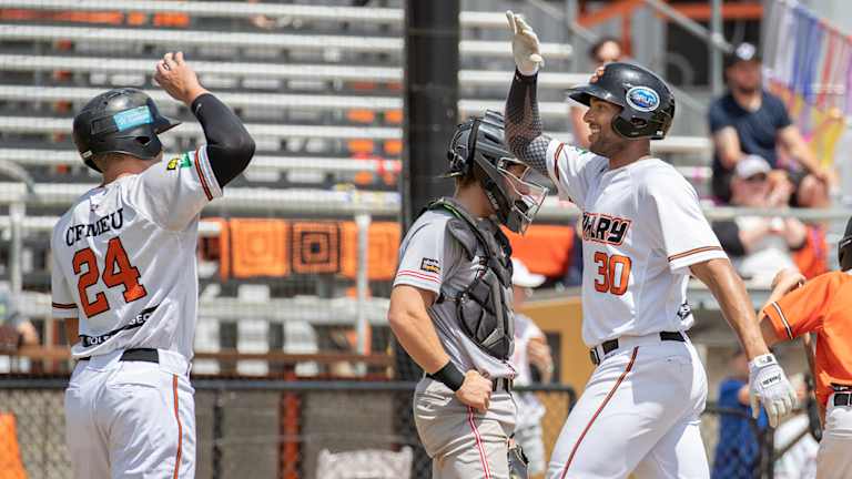 Canberra Cavalry's Zach Wilson and Michael Crouse celebrate.