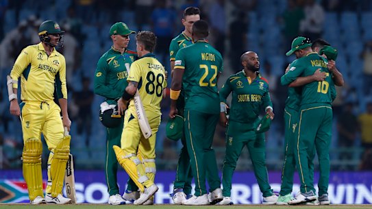 South Africa team members celebrate their team’s win over Australia.