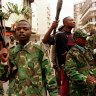 Zairean civil guardsmen patrolling the streets of what is now the Democratic Republic of the Congo.
