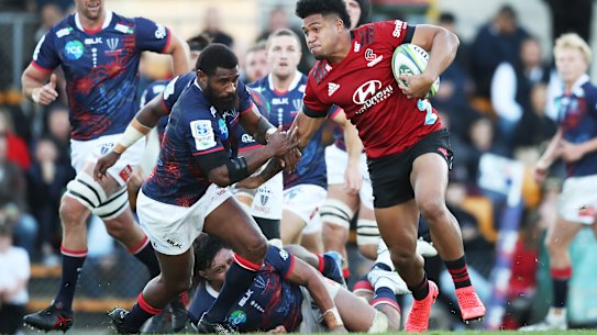 SYDNEY, AUSTRALIA - JUNE 12: Leicester Fainga’anuku of the Crusaders makes a break during the round five Super Rugby Trans-Tasman match between the Melbourne Rebels and the Crusaders at Leichhardt Oval on June 12, 2021 in Sydney, Australia. (Photo by Matt King/Getty Images)