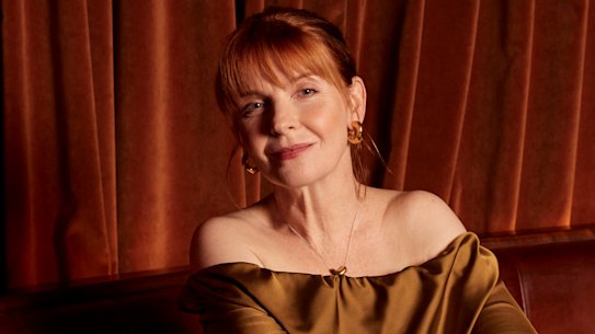 Jacqueline McKenzie wears Bianca Spender dress. Dinosaur Designs jewellery.