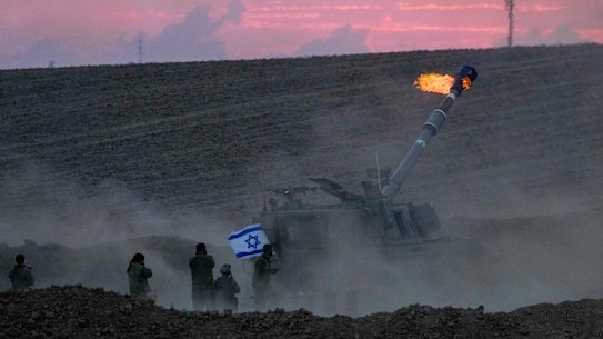 An Israeli mobile artillery unit fires a shell from southern Israel toward the Gaza Strip, in a position near the Israel-Gaza border, Israel, Saturday, Oct. 14, 2023. (AP Photo/Maya Allerruzzo)