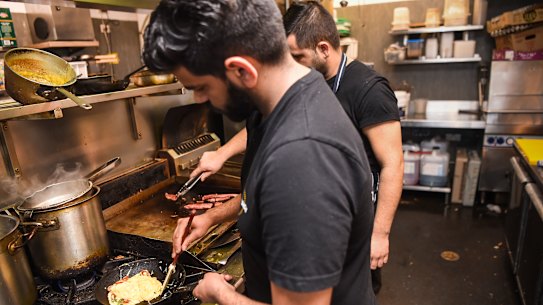 Australians spent a record $5 billion through cafes, restaurants and takeaways in July in a sign consumers are holding up in the face of inflation and higher interest rates.