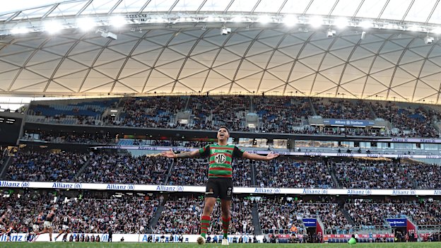Box office: Latrell Mitchell roars to the crowd after nailing a sideline conversion against the Roosters.