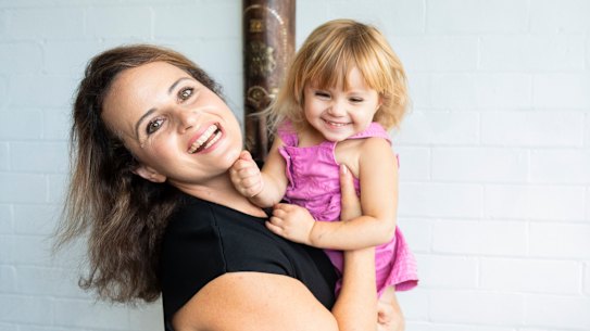 Coniglio said she thought it would be a great time to purchase during Sydney’s downturn. Pictured with her daughter.