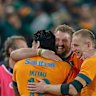Wallabies celebrate.
