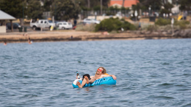Chilling out at Williamstown beach on Tuesday.