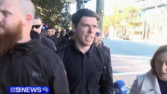 “Proud to be racist”: Jack Eltis being interviewed by a reporter after the March for Australia rally.