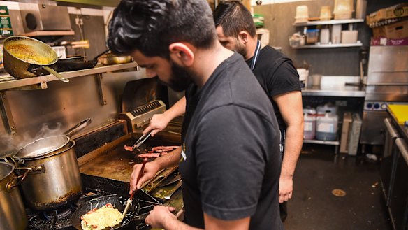 Australians spent a record $5 billion at cafes and restaurants and on takeaways in July in a sign consumers are holding up in the face of inflation and higher interest rates.