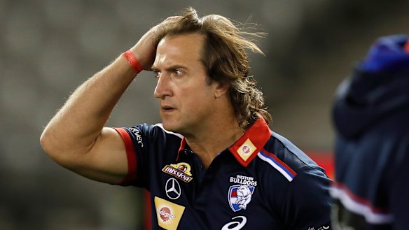 Luke Beveridge says the AFL should have consulted more widely before changing the interpretation of holding the ball.