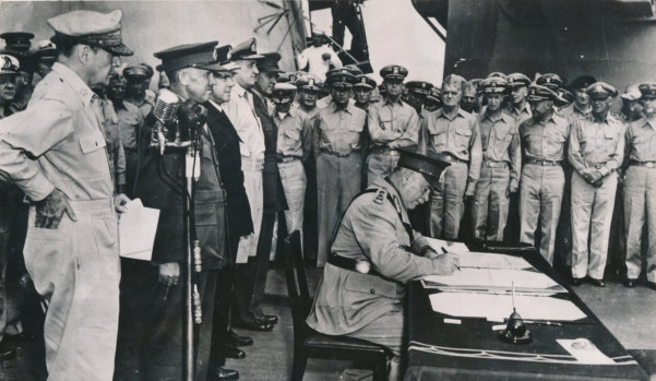 Representing Australia, General Sir Thomas Blamey signs the Japanese surrender document on board the USS Missouri.