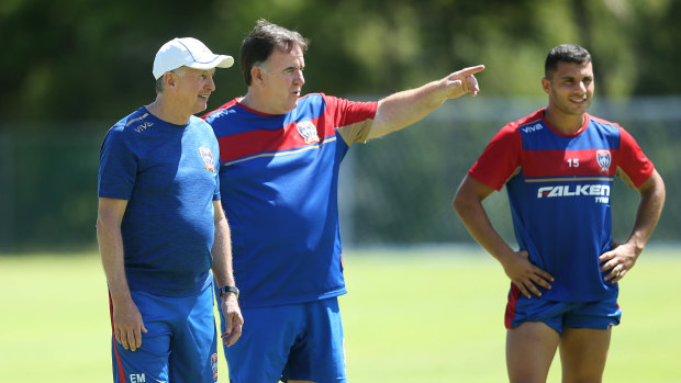 Team: Lawrie McKinna points the way at training with Jets coach Ernie Merrick.
