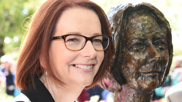 Julia Gillard with her bust in 2014.