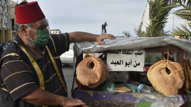Street vendor Abu al-Abed sells kaak bread in Beirut.
