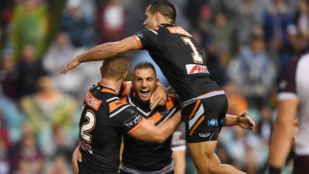 Super Saturday: Robbie Farah celebrates with teammates after scoring a try against Manly.