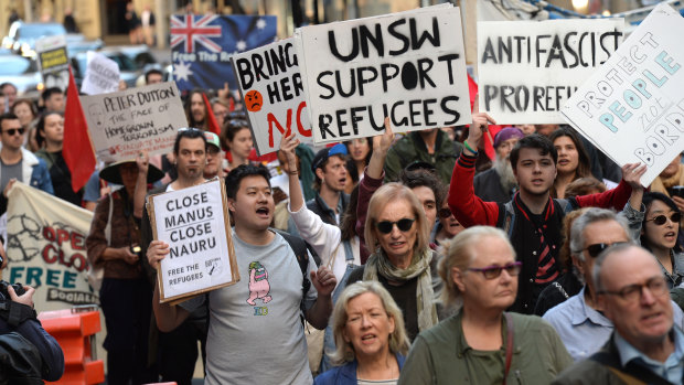 Refugee advocates took the streets in Sydney in national rallies to mark six years since the implementation of offshore detention on Manus and Nauru.