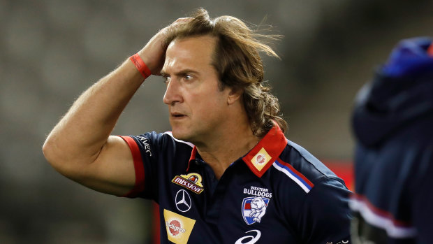 Luke Beveridge says the AFL should have consulted more widely before changing the interpretation of holding the ball.