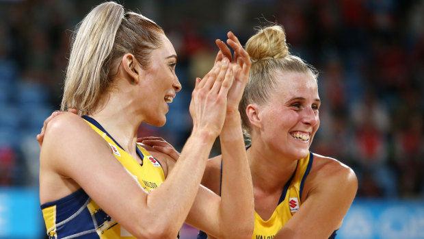 Helen Housby (left) and Maddy Turner celebrate victory against the Magpies.