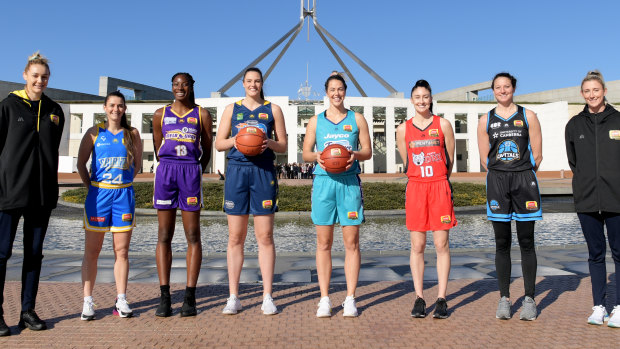 Tip off: WNBL players (left to right) Darcee Garbin, Tessa Lavey, Ezi Magbegor, Lauren Scherf, Jenna O'Hea, Katie Ebzery, Kelsey Griffin and Lauren Nicholson during launch day for the league's 40th season.