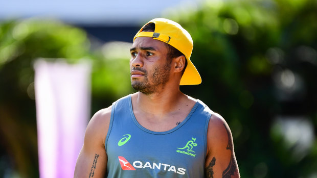 Halfback Will Genia looks on at Wallabies training on Monday. 