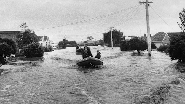 Army dinghies patrol Navigator Street in Maribyrnong during the 1974 flood.