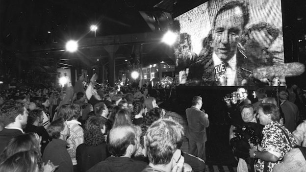 Prime Minister Paul Keating is on the big screen as Sydneysiders celebrate at Circular Quay.