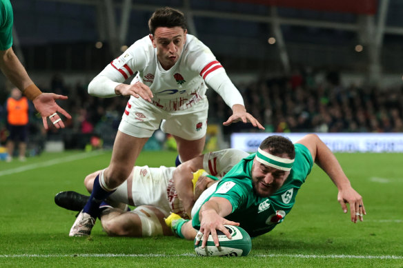 Rob Herring of Ireland scores their side’s fourth try.