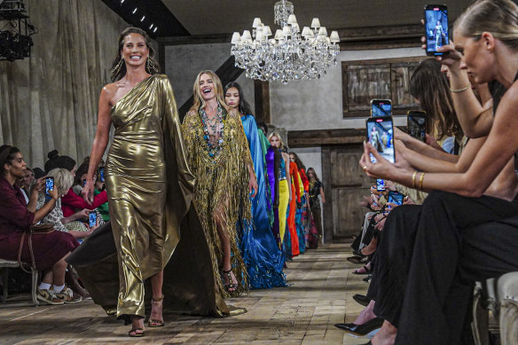 Christy Turlington, left, lead models on their final walk on the runway to close the showing of Ralph Lauren’s collection at New York Fashion Week.