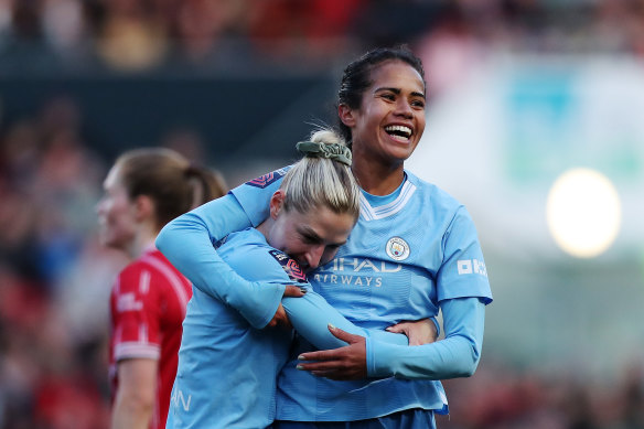 Mary Fowler celebrates with Laura Coombs after scoring the opener for Manchester City at Ashton Gate.