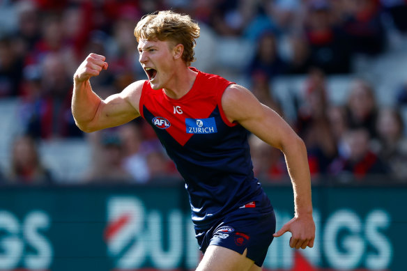 Melbourne’s Jacob van Rooyen celebrates his first AFL goal, in his debut against the Swans
