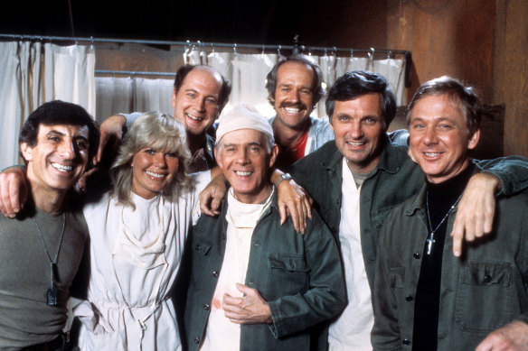 The cast of M*A*S*H, from left; Jamie Farr, Loretta Swit, David Ogden Stiers, Harry Morgan, Mike Farrell,  Alan Alda, William Christopher.