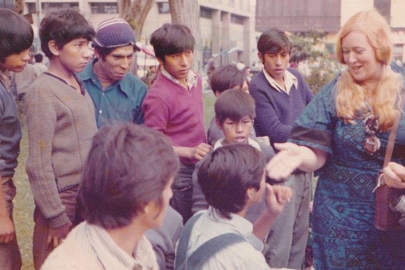 Jo Connolly with locals and tourists in Lima, Peru, in the 1970s.
